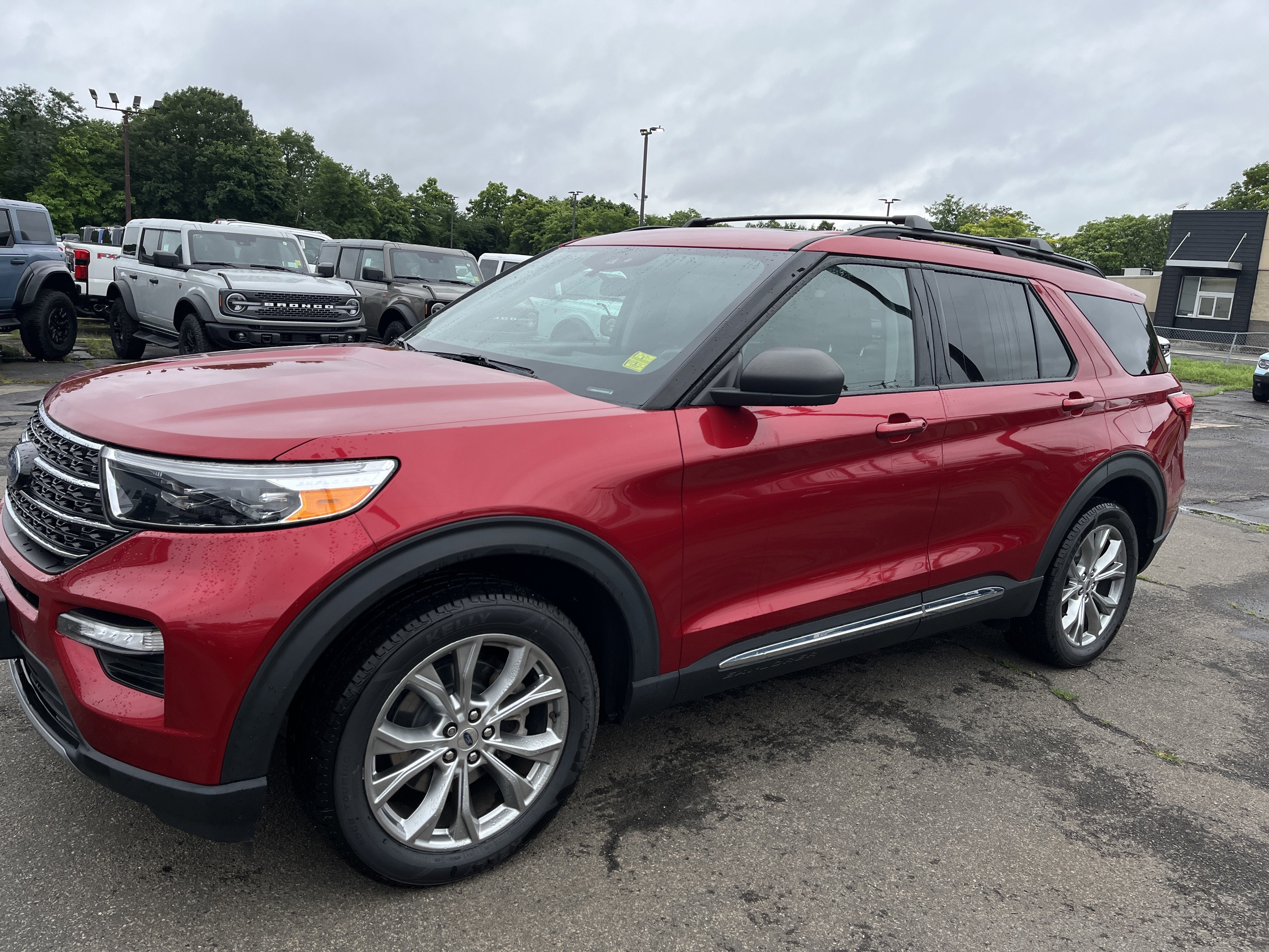 2021 Ford Explorer XLT in Red — front three-quarter view