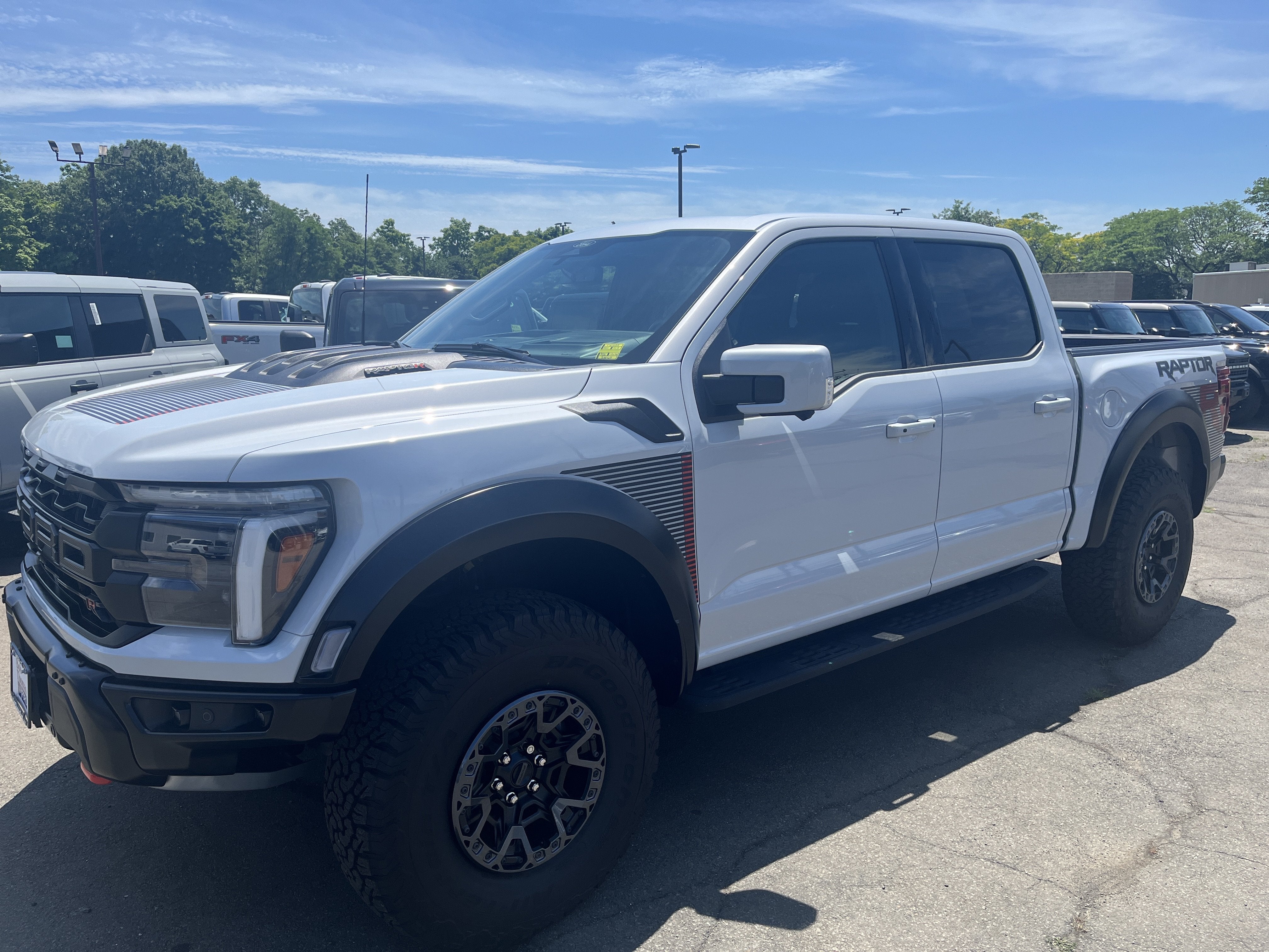 2025 Ford F-150 Raptor in White — front three-quarter view