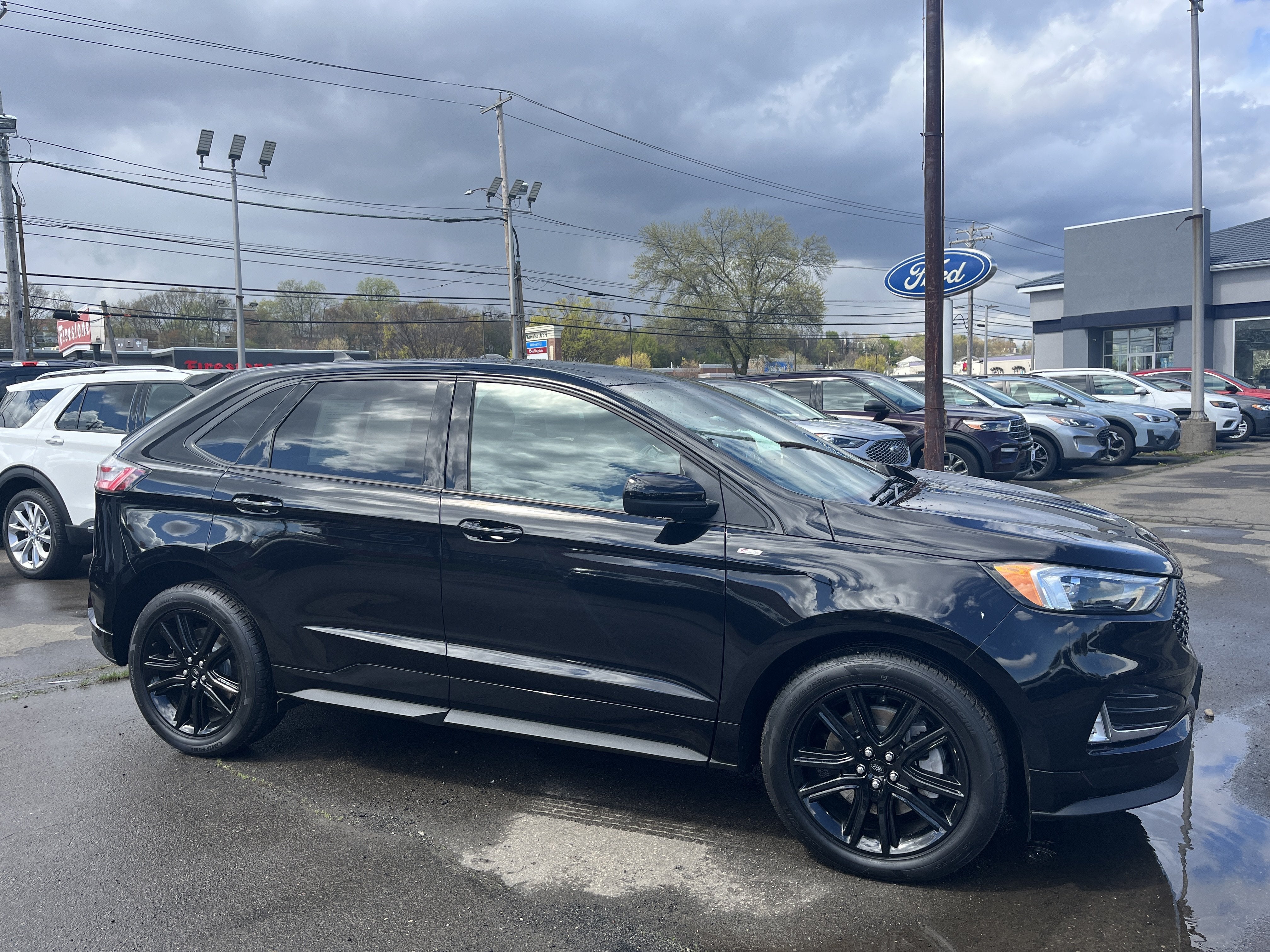2023 Ford Edge AGATE BLAC in Agate Black Metal — front three-quarter view