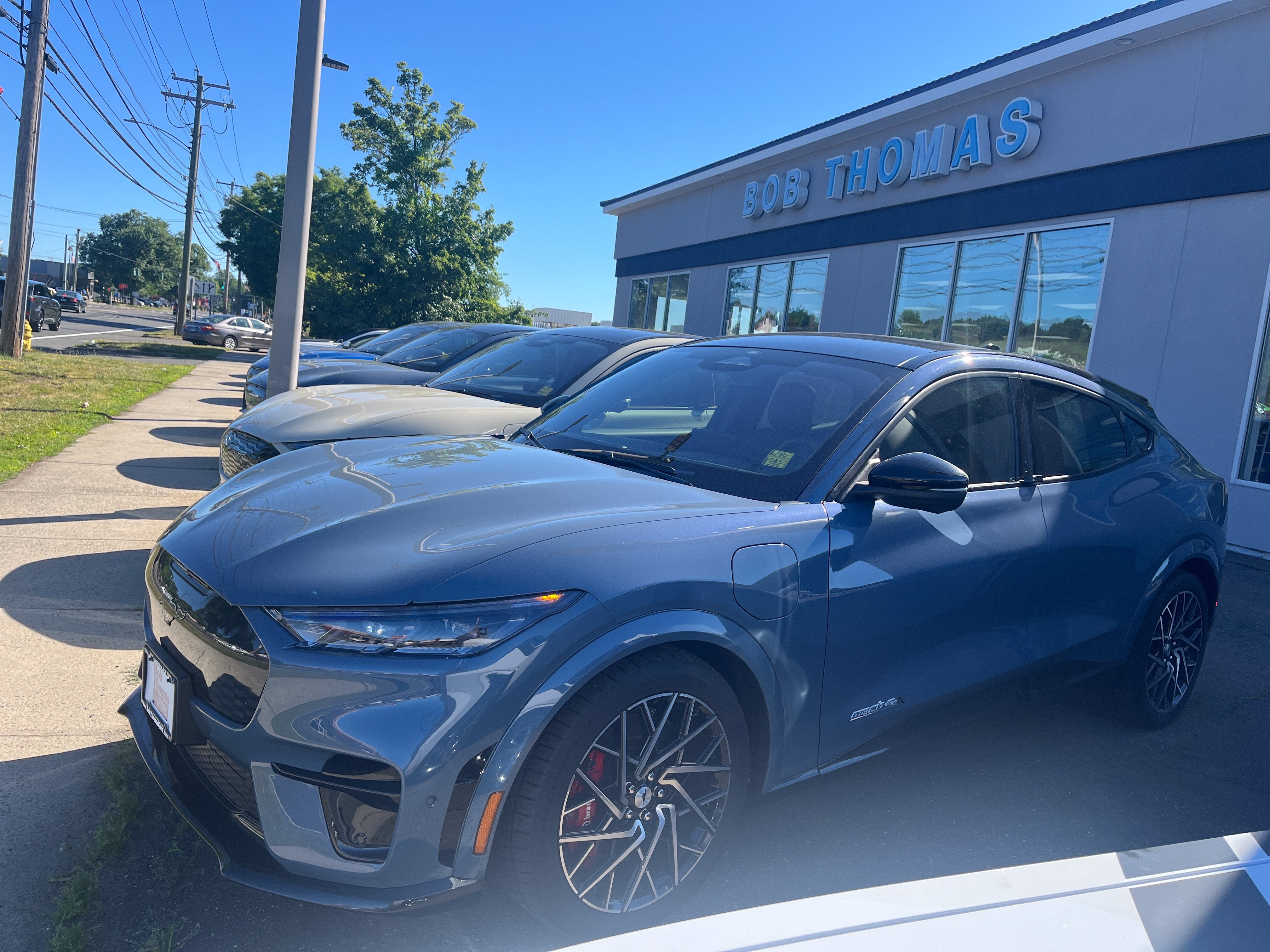 2023 Ford Mustang Mach-E GT in Blue — front three-quarter view