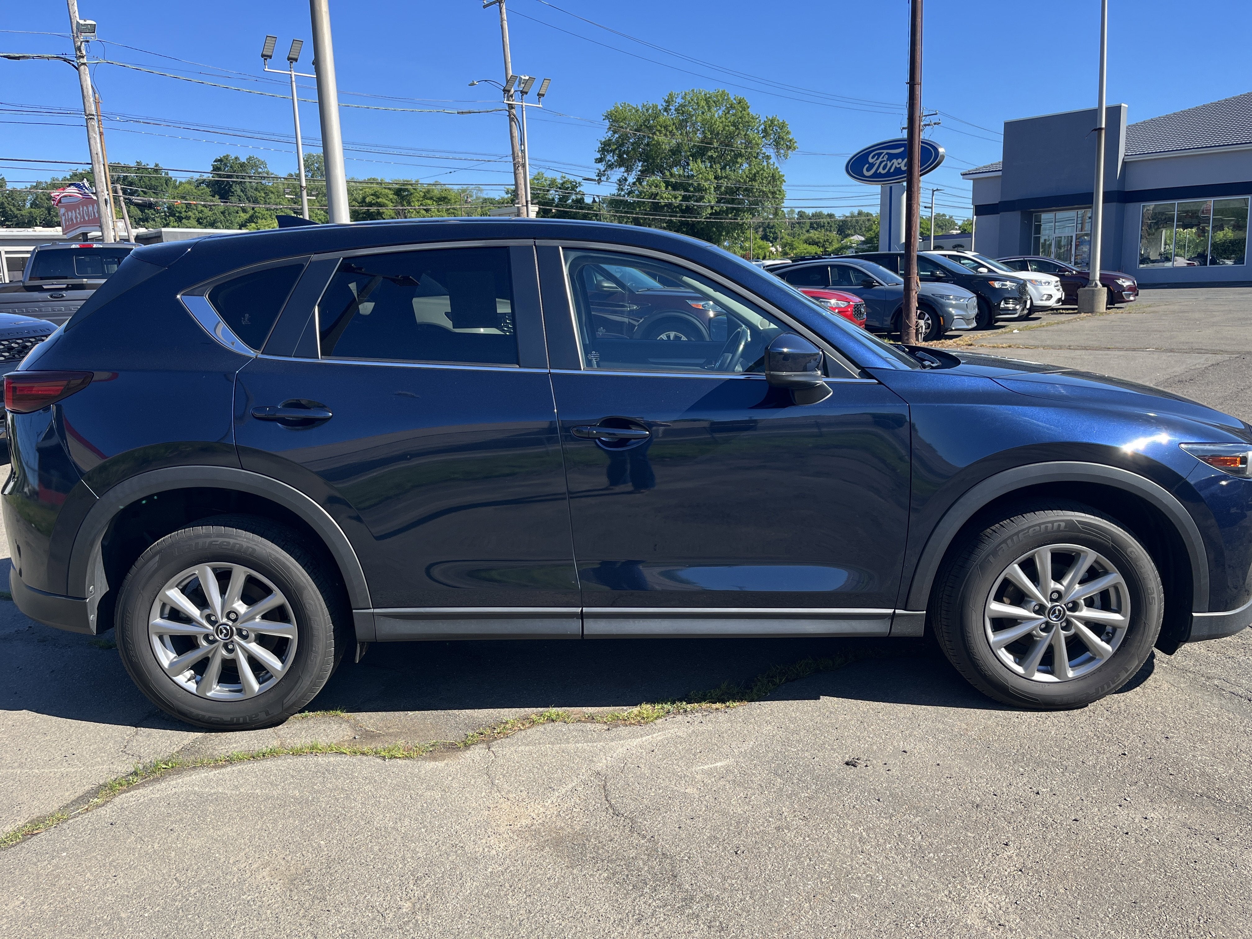 2022 Mazda Mazda CX-5 2.5 S Preferred Package in Deep Crystal Blue Mica — front three-quarter view