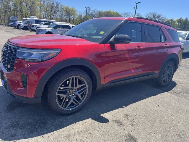 2026 Ford Explorer ST in Rapid Red Met T — front three-quarter view