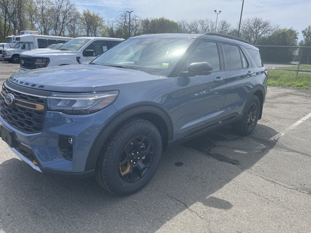 2026 Ford Explorer Tremor in Vapor Blu Met — front three-quarter view
