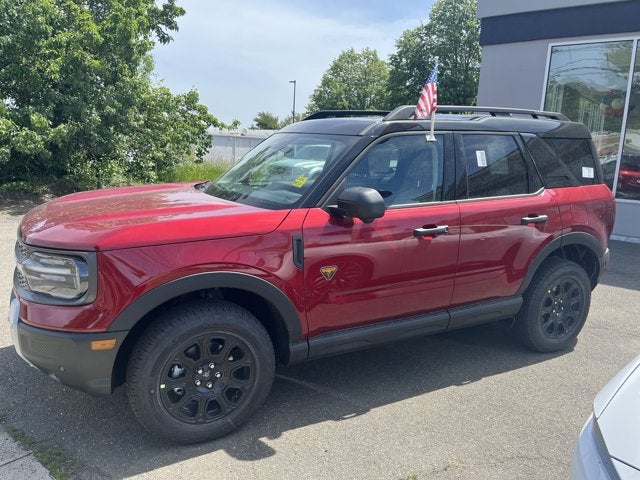 2026 Ford Bronco Sport Badlands in Ruby Red Met Ti — front three-quarter view