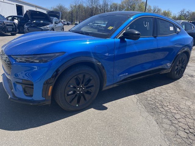 2026 Ford Mustang Mach-E Premium in Velocity Blue Metallic — front three-quarter view